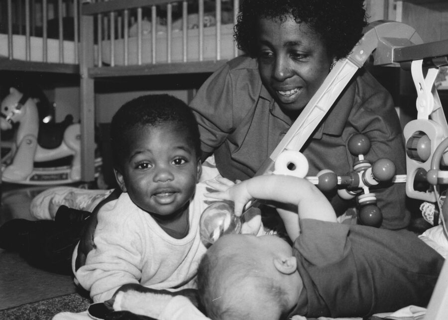 black and white photo of mother playing with son almost 35 years ago