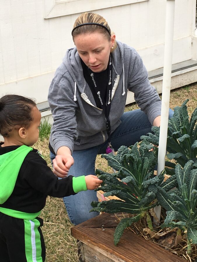 Photo of teacher and student in garden at Vogel